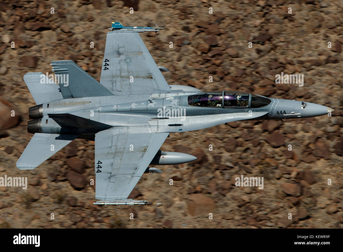 McDonnell Douglas F/A-18D Hornet (XE-444) from the United States Navy / United States Marines VX-9 Vampires squadron Naval Air Weapons Station China Lake, flies low level through the Jedi Transition, Star Wars Canyon, Death Valley National Park, California, United States of America Stock Photo