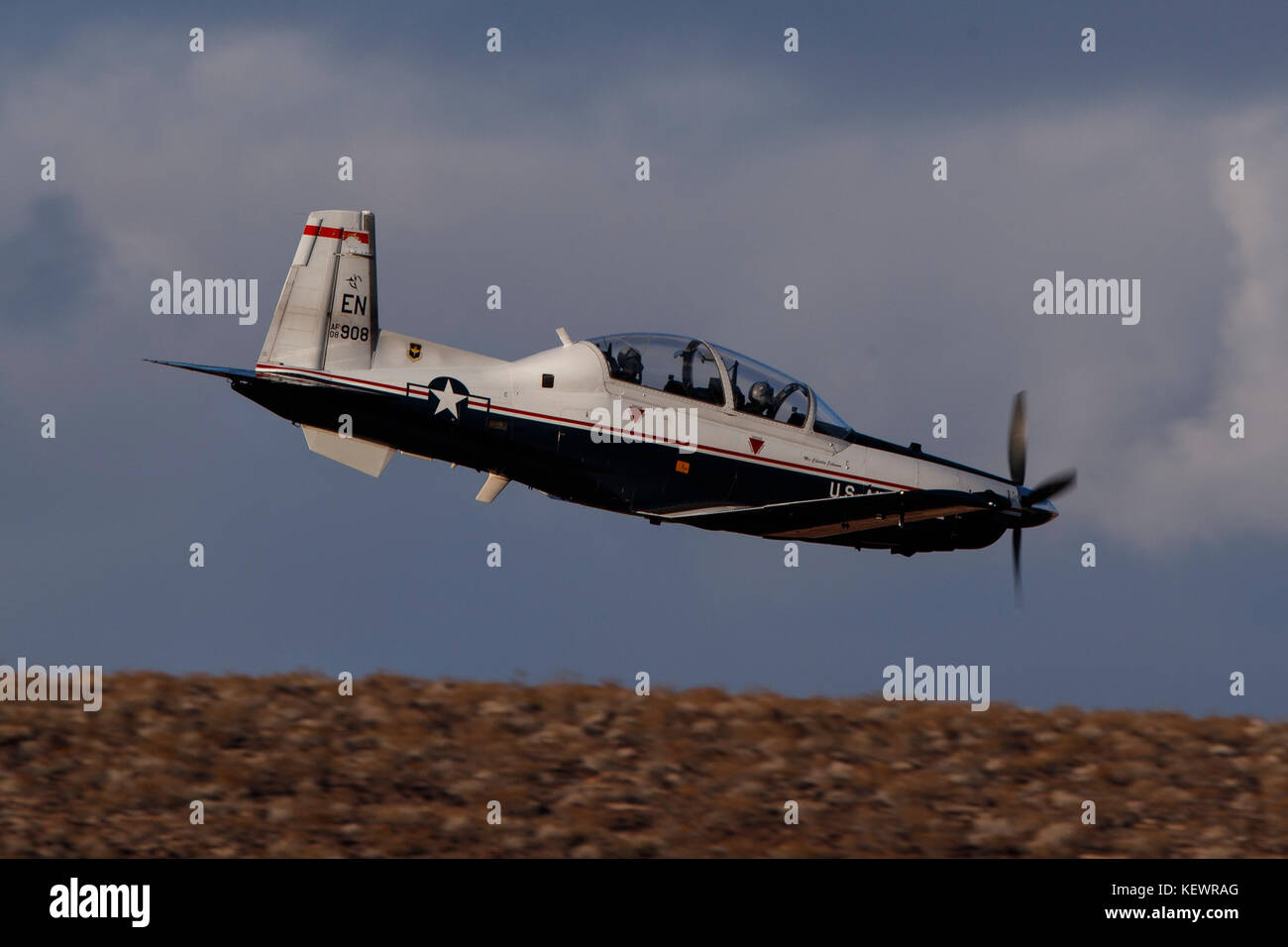 Beechcraft T-6 Texan II from United States Air Force 80th Flying Training Wing, Sheppard Air Force Base, Texas, flies low level through the Jedi Transition, Star Wars Canyon, Death Valley National Park, California, United States of America Stock Photo