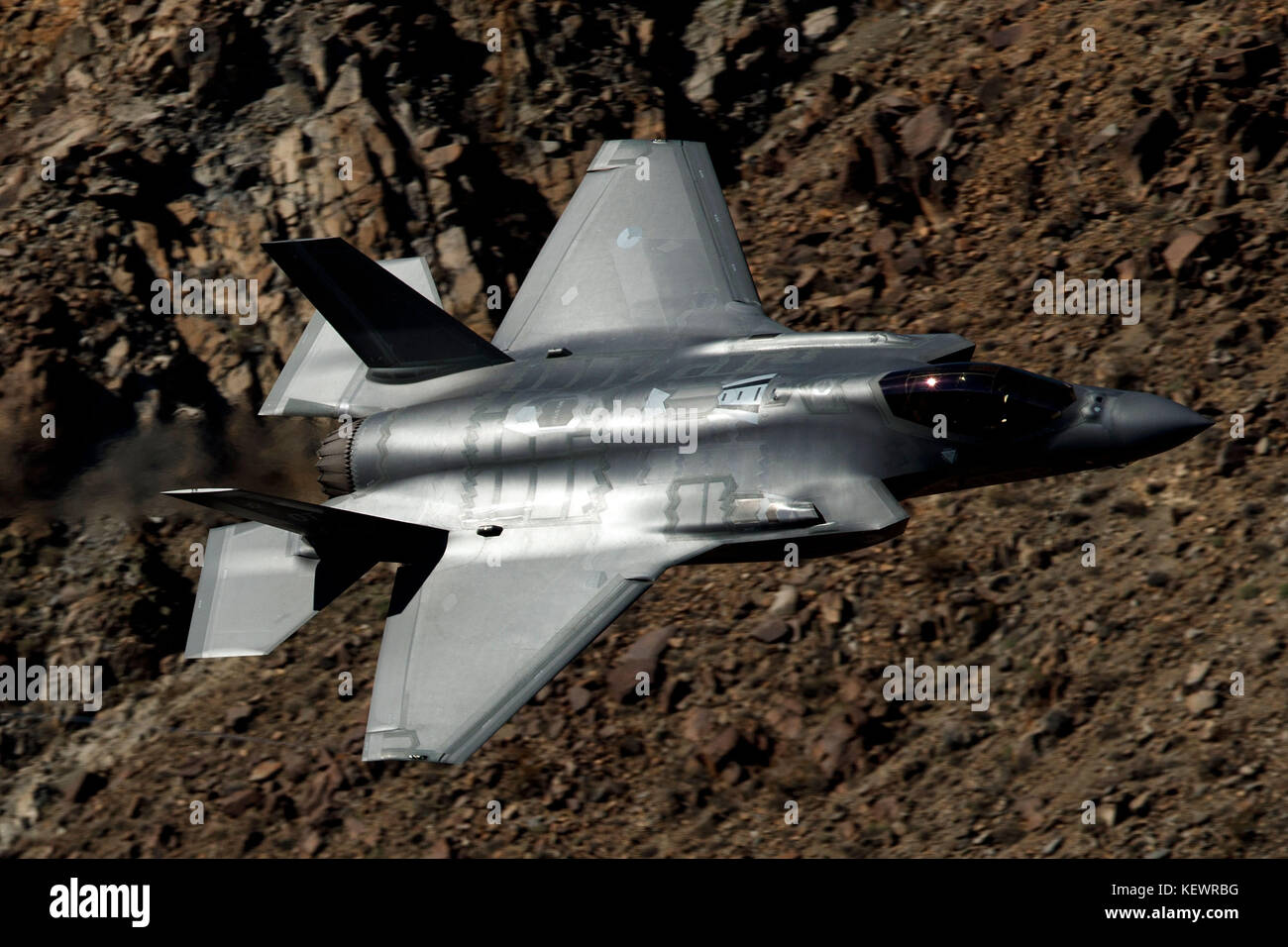 Lockheed Martin F-35A Lighting II (OT-002) from the 323 Squadron, Royal Netherlands Air Force, flies low level through the Jedi Transition, Star Wars Canyon, Death Valley National Park, California, United States of America Stock Photo
