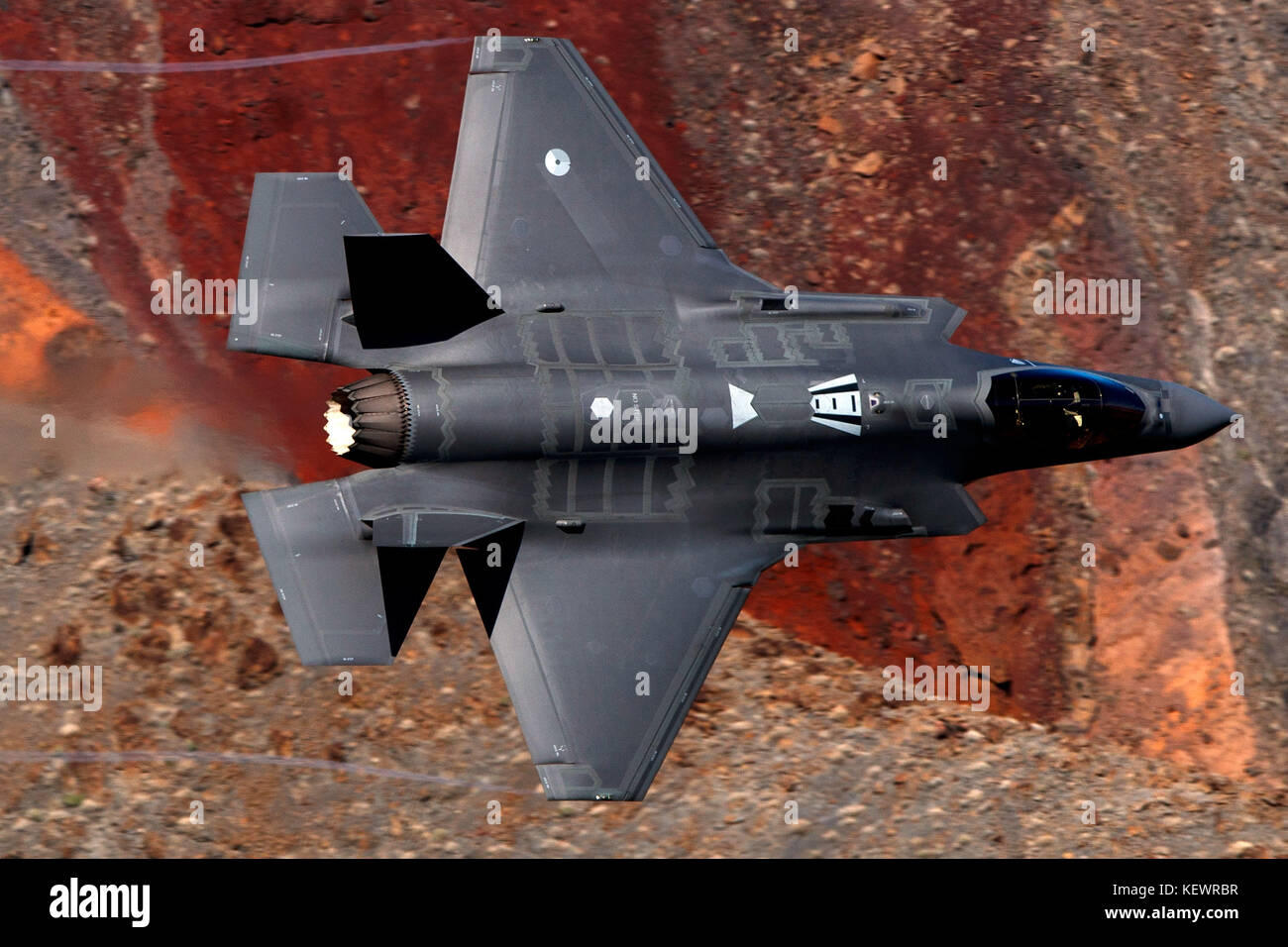 Lockheed Martin F-35A Lighting II (OT-002) from the 323 Squadron, Royal Netherlands Air Force, flies low level through the Jedi Transition, Star Wars Canyon, Death Valley National Park, California, United States of America Stock Photo