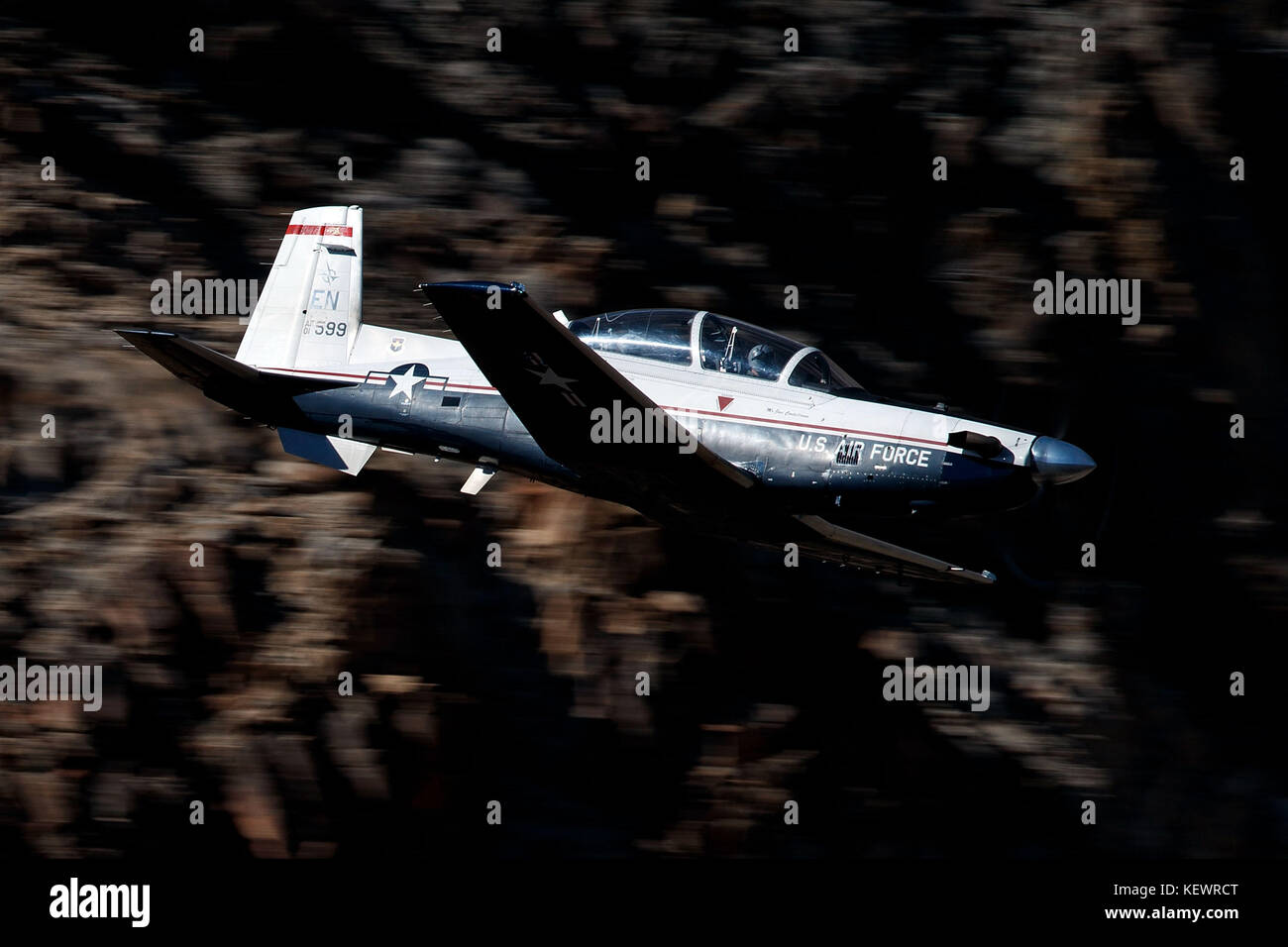United States Air Force Beechcraft T-6 Texan II (01-599) from the 80th Flying Training Wing, Sheppard Air Force Base, Texas, flies low level through the Jedi Transition, Star Wars Canyon, Death Valley National Park, California, United States of America Stock Photo