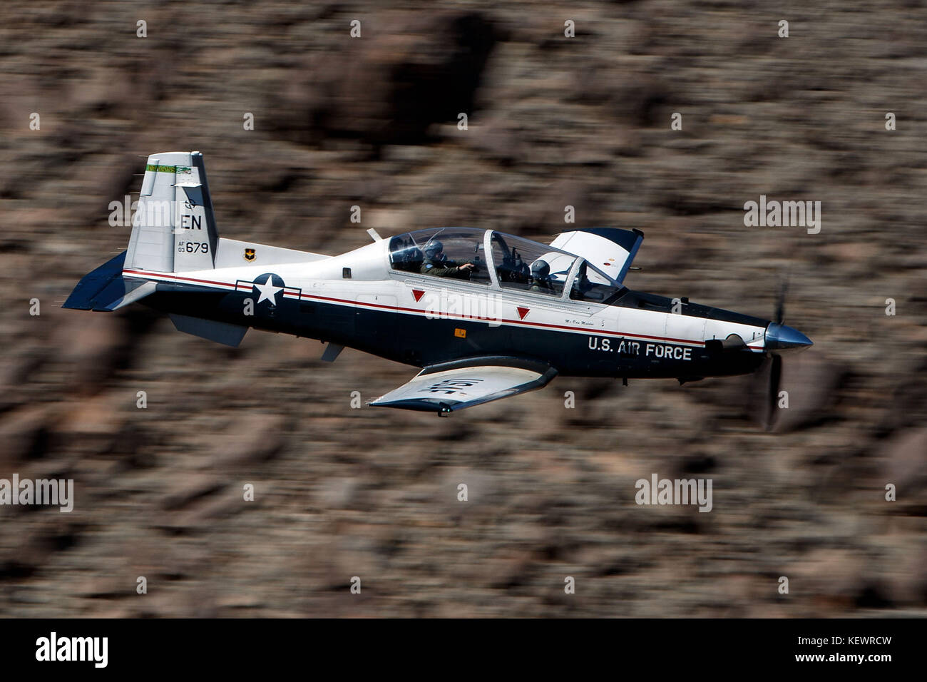 United States Air Force Beechcraft T-6 Texan II (03-679) from the 80th Flying Training Wing, Sheppard Air Force Base, Texas, flies low level through the Jedi Transition, Star Wars Canyon, Death Valley National Park, California, United States of America Stock Photo