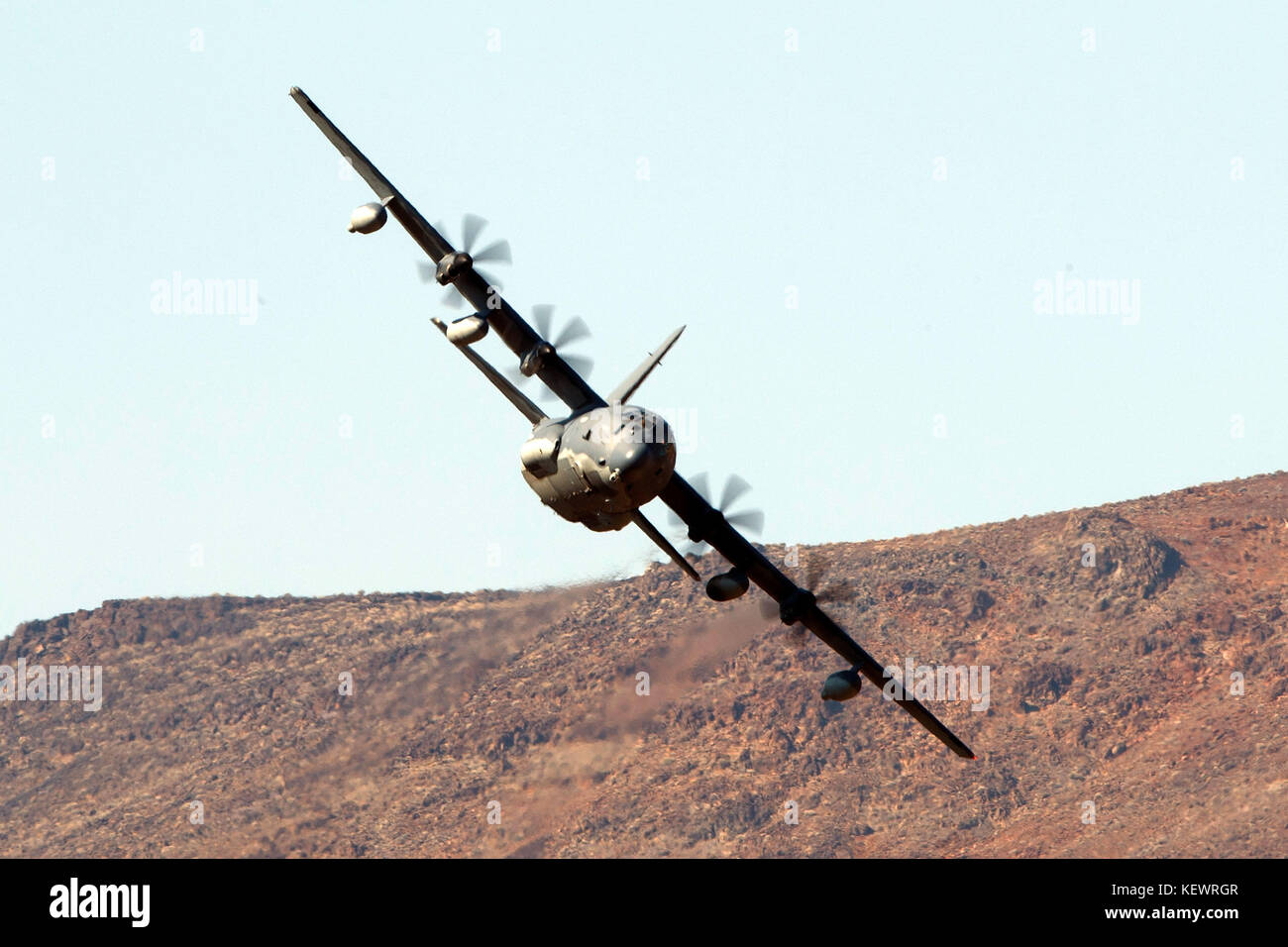 United States Air Force Lockheed HC-130J Combat King II from the 79th Rescue Squadron, Davis-Monthan Air Force Base, flies low level on the Jedi Transition through Star Wars Canyon / Rainbow Canyon, Death Valley National Park, Panamint Springs, California, United States of America Stock Photo