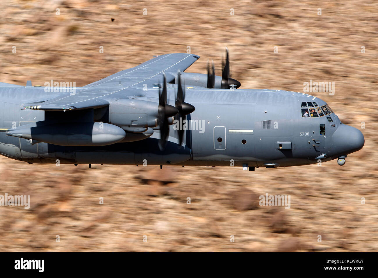 United States Air Force Lockheed HC-130J Combat King II from the 79th Rescue Squadron, Davis-Monthan Air Force Base, flies low level on the Jedi Transition through Star Wars Canyon / Rainbow Canyon, Death Valley National Park, Panamint Springs, California, United States of America Stock Photo