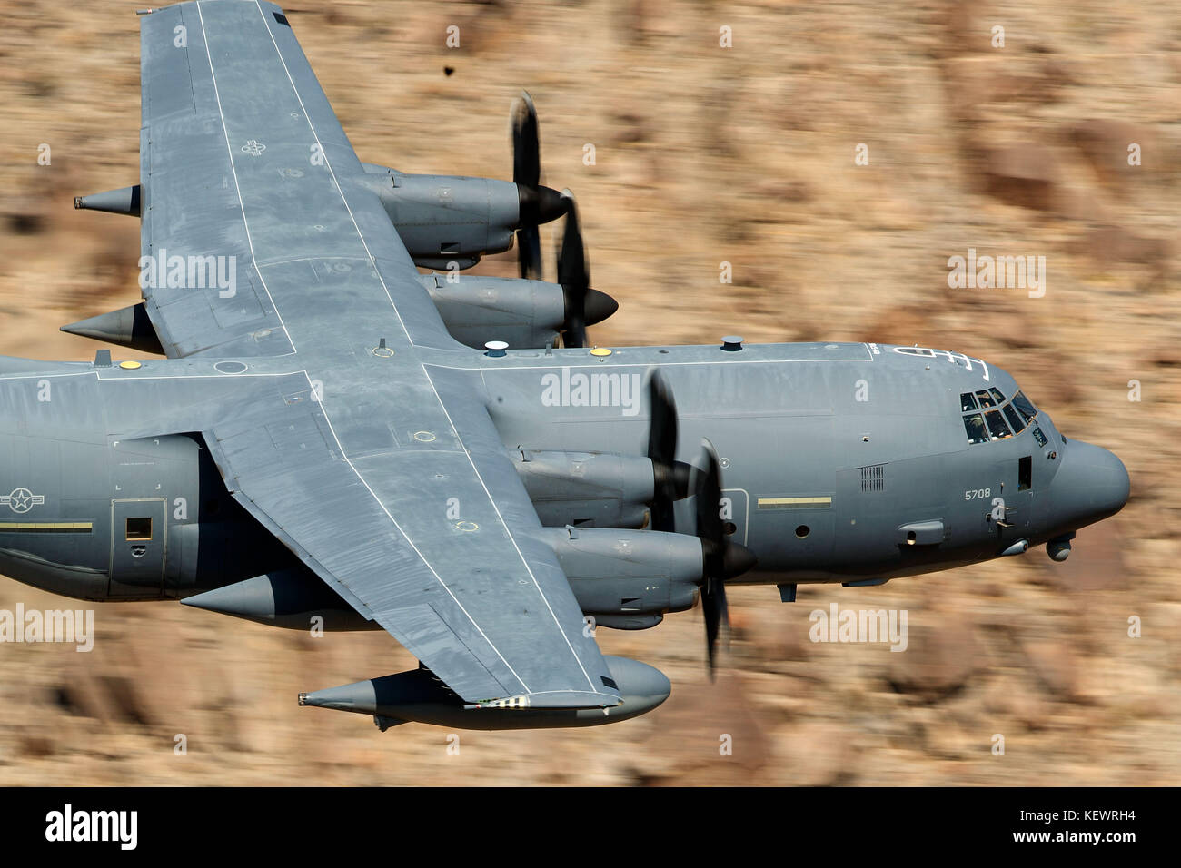 United States Air Force Lockheed HC-130J Combat King II from the 79th Rescue Squadron, Davis-Monthan Air Force Base, flies low level on the Jedi Transition through Star Wars Canyon / Rainbow Canyon, Death Valley National Park, Panamint Springs, California, United States of America Stock Photo