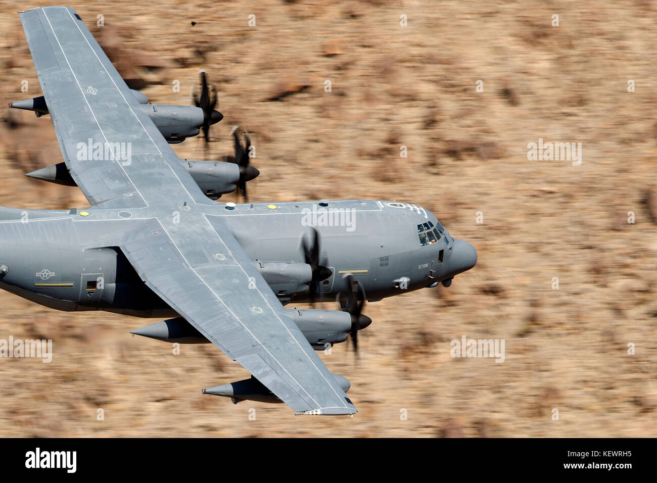 United States Air Force Lockheed HC-130J Combat King II from the 79th Rescue Squadron, Davis-Monthan Air Force Base, flies low level on the Jedi Transition through Star Wars Canyon / Rainbow Canyon, Death Valley National Park, Panamint Springs, California, United States of America Stock Photo