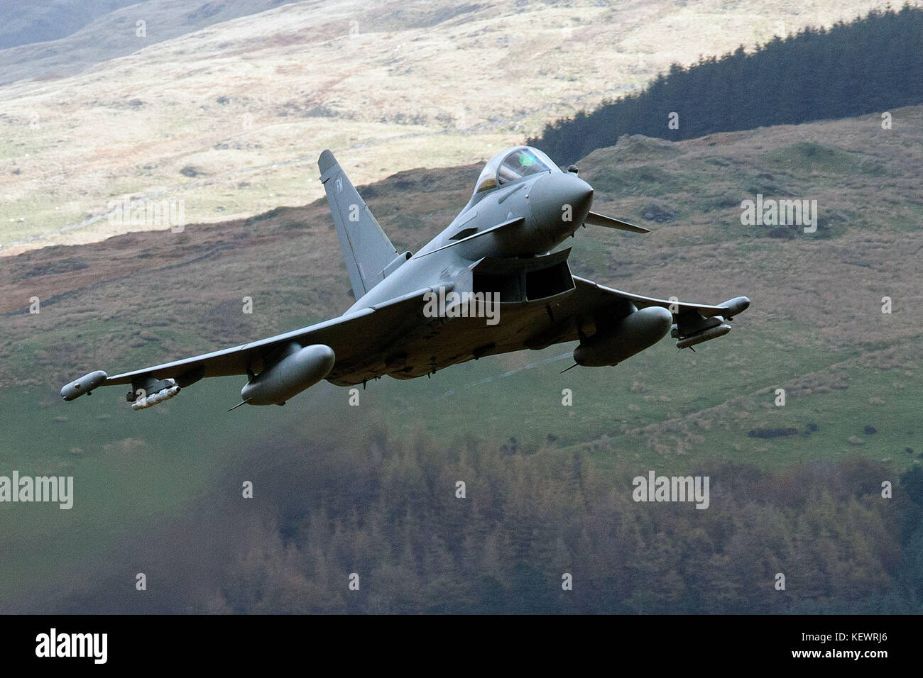 Royal Air Force Eurofighter Typhoon FGR4 (ZK304) flies low level through the Mach Loop, Machynlleth, Wales, United Kingdom Stock Photo