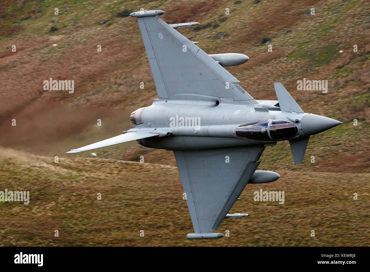 Royal Air Force Eurofighter Typhoon FGR4 (ZK313) flies low level through the Mach Loop, Machynlleth, Wales, United Kingdom Stock Photo