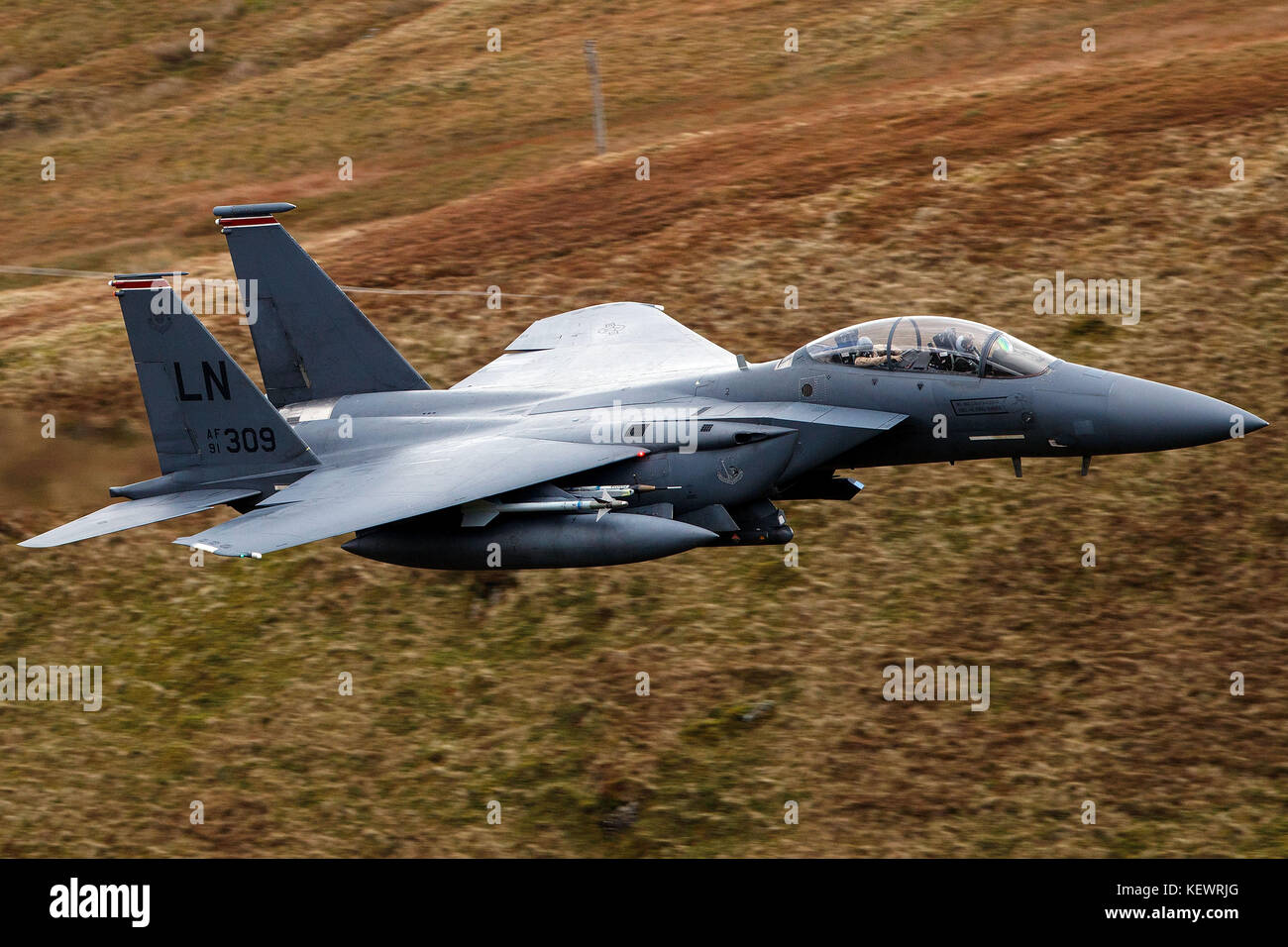 United States Air Force McDonnell-Douglas F-15E Strike Eagle (LN 91-309) from the 48th Fighter Wing, 494th Fighter Squadron based at RAF Lakenheath, England, flies low level through the Mach Loop, Machynlleth, Wales, United Kingdom Stock Photo