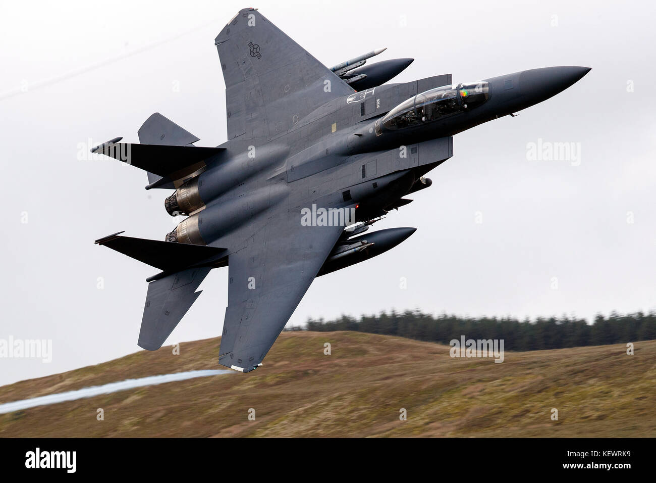 United States Air Force McDonnell-Douglas F-15E Strike Eagle (LN 91-326) from the 48th Fighter Wing, 494th Fighter Squadron based at RAF Lakenheath, England, flies low level through the Mach Loop, Machynlleth, Wales, United Kingdom Stock Photo