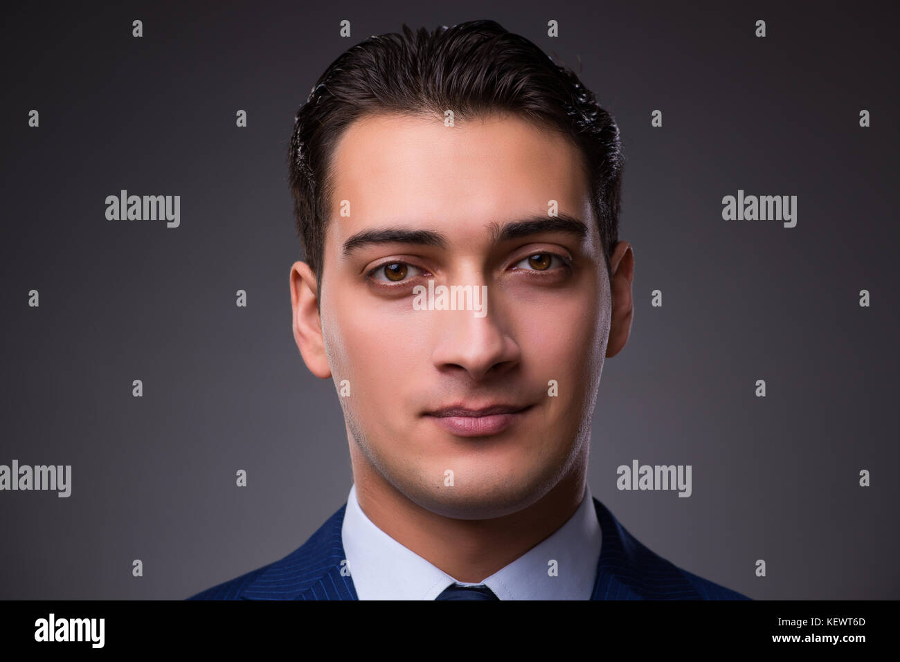 Portrait of young handsome businessman Stock Photo - Alamy