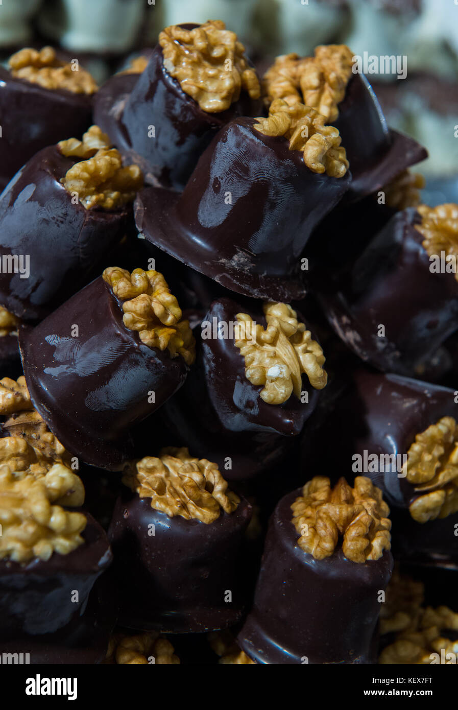 Delicious homemade dark chocolate walnut sweets, confectionery, on ...