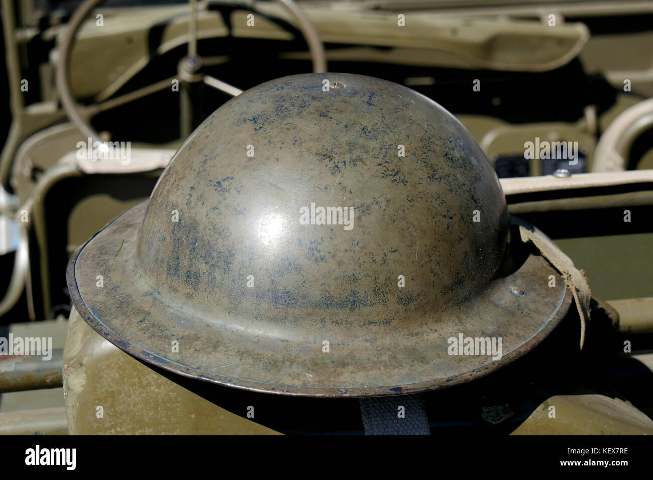 a british helmet of World War II on the jeep Stock Photo