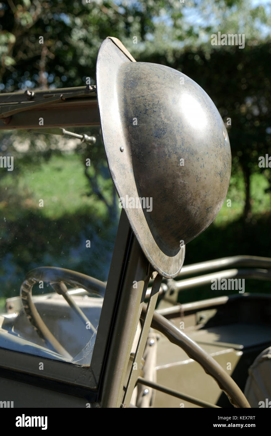 a british helmet of World War II on the jeep Stock Photo