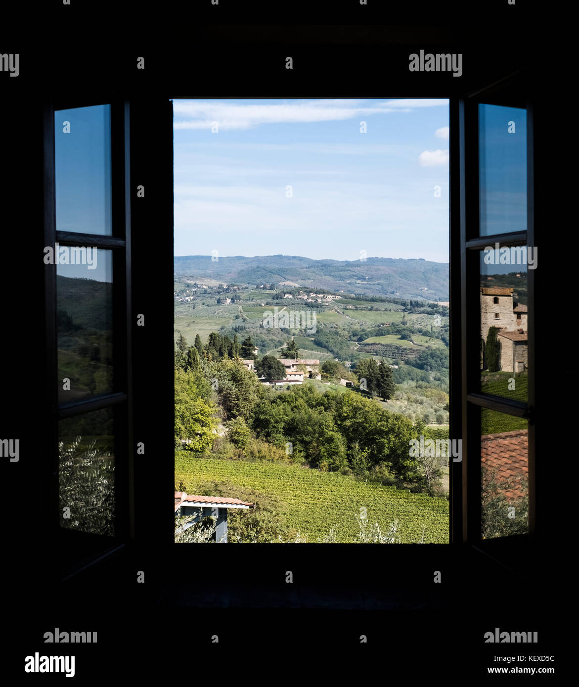 View through a window of apartment in Tuscany to the hills with