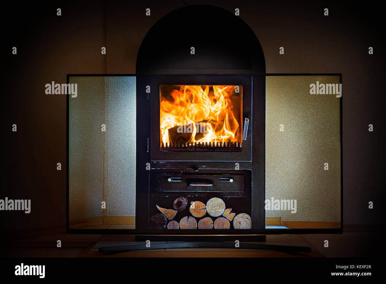 The Television With The Video Of The Burning Stove Stands Before