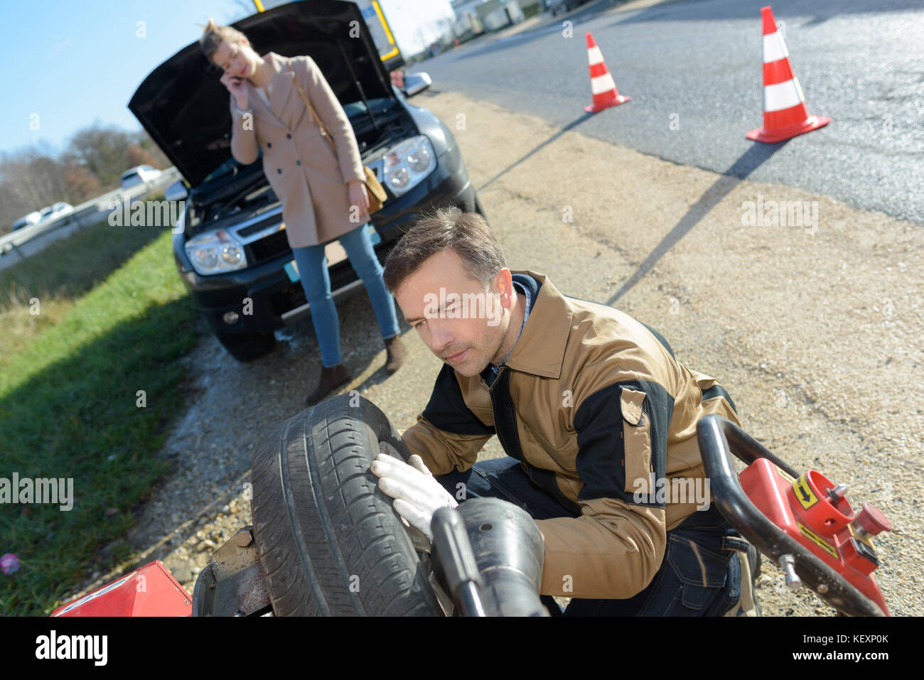 Mobile roadside tire changing service Stock Photo