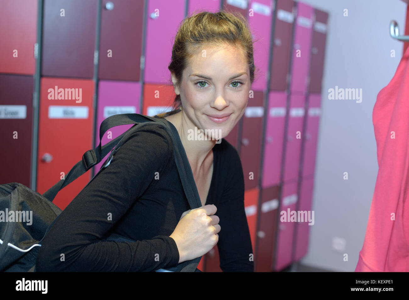 smiling woman ready for a workout in the gym Stock Photo