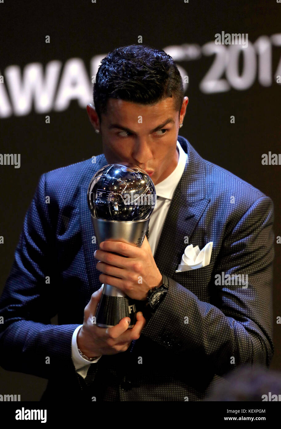 Cristiano Ronaldo kisses his award for FIFA Men's Player of the Year