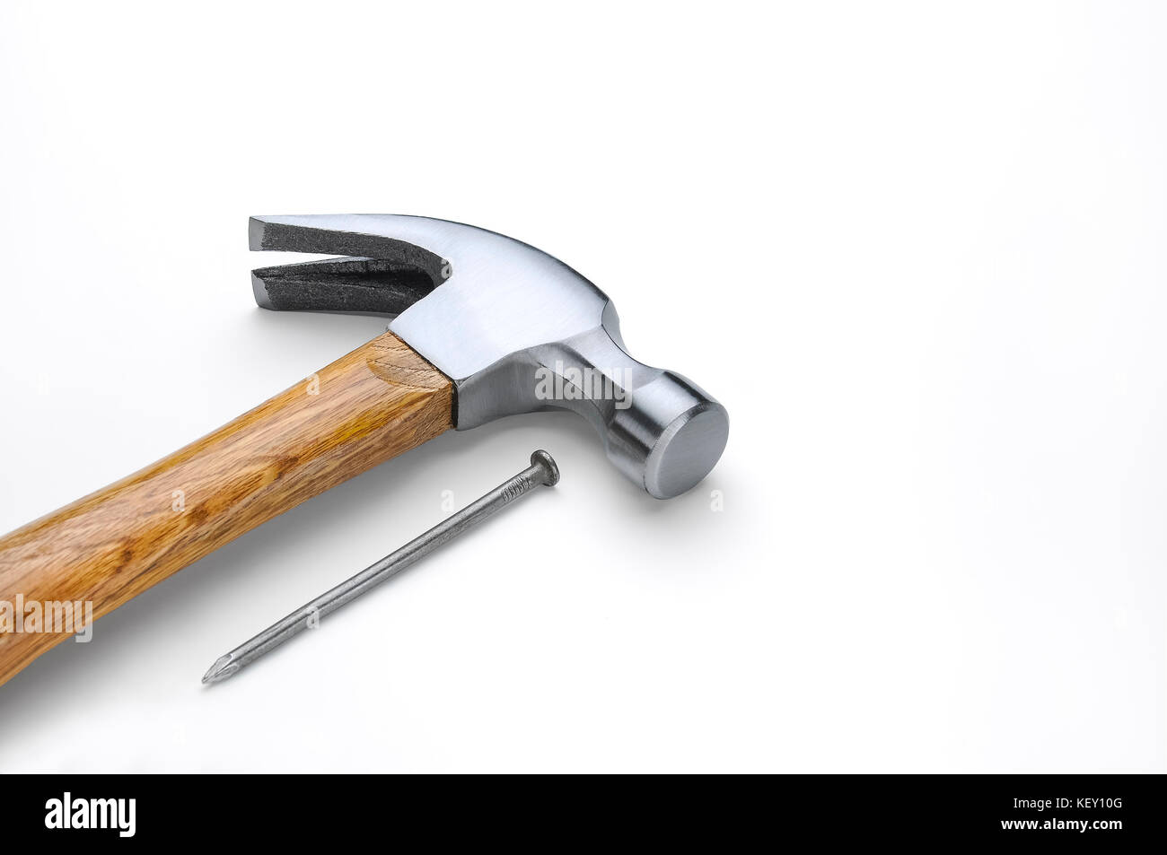 Claw hammer and nail for construction isolated on white Stock Photo Alamy