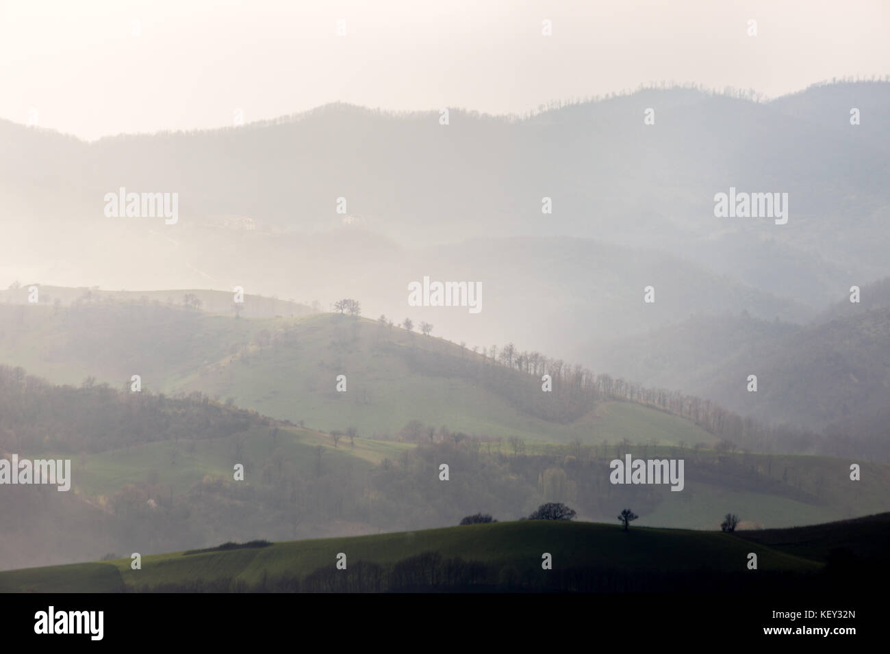 Various layers of hills and mountains with mist between them Stock ...