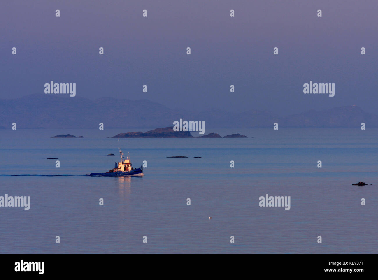 KRISTIANSAND ARCHIPELAGO, NORWAY ON JULY 03, 2009. View of a tug