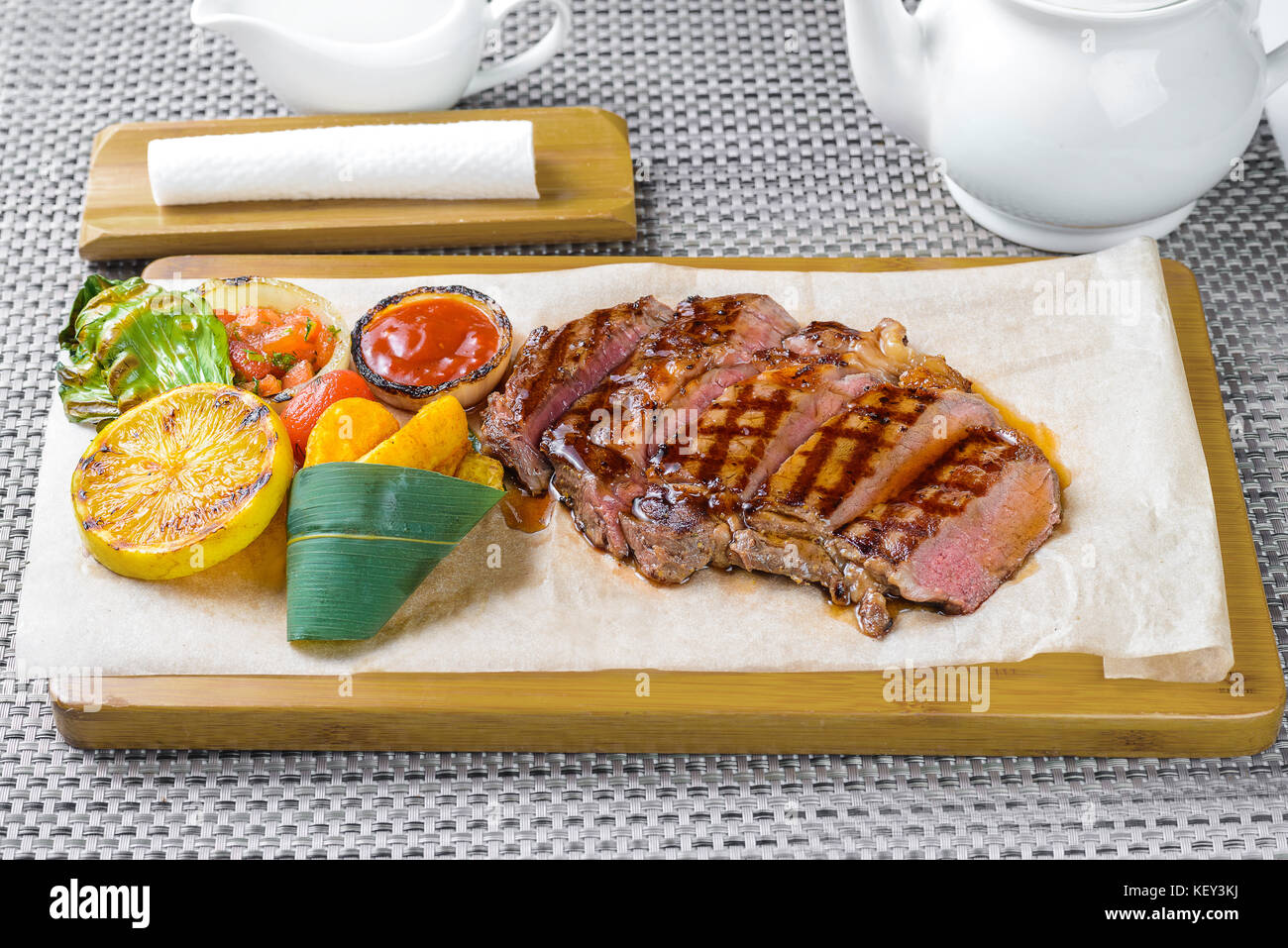 Fried meat with sauce and potatoes Stock Photo