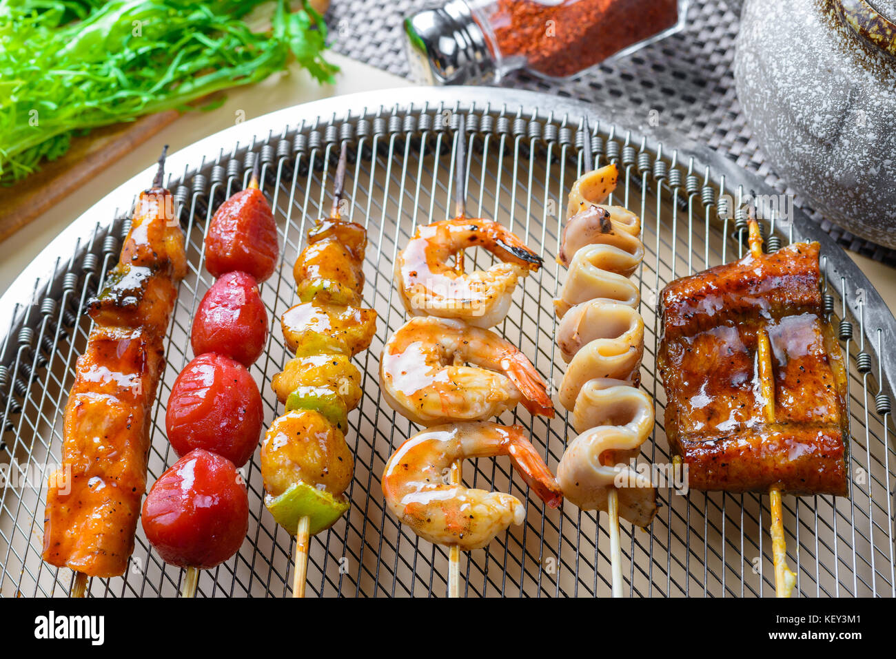 Seafood barbecue on grill Stock Photo