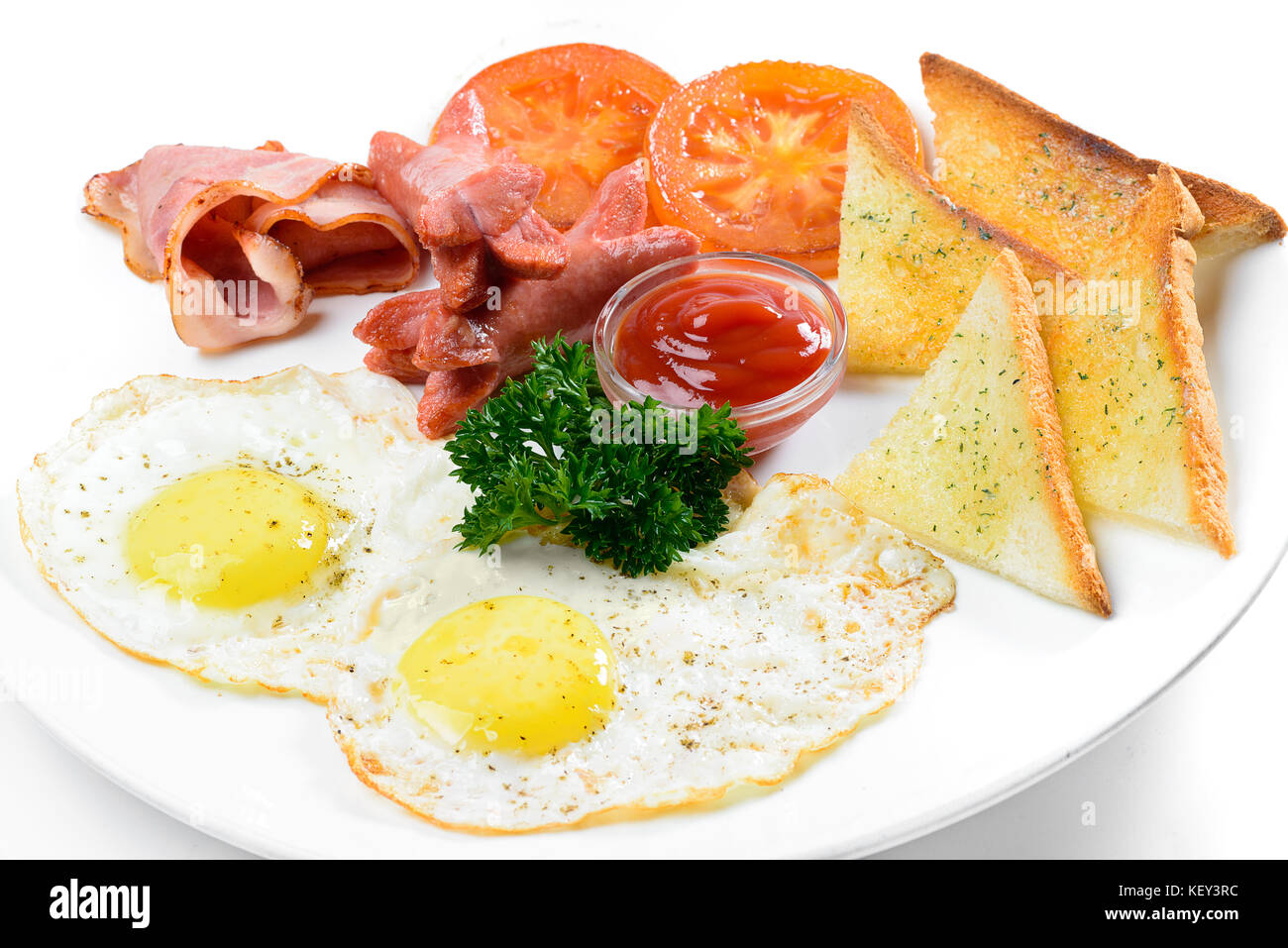 Scrambled eggs with toast and gravy Stock Photo