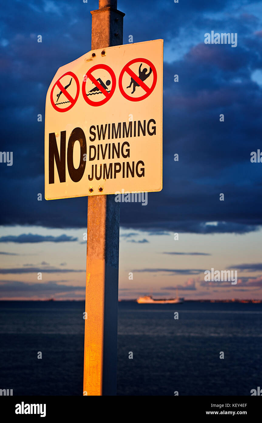 Warning sign on jetty hi-res stock photography and images - Alamy