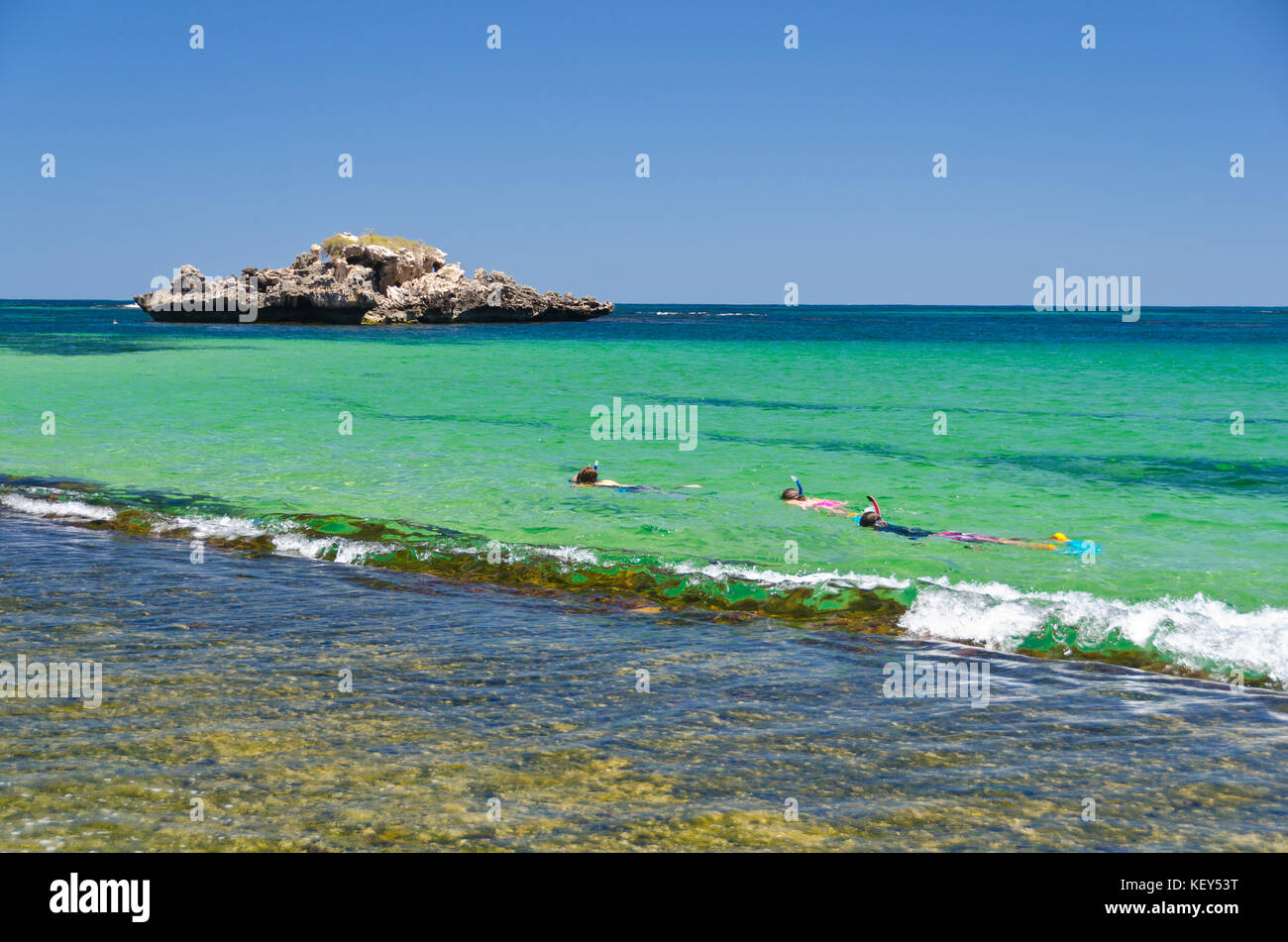 Holiday makers snorkeling in the clear water at Point Peron, Rockingham Western Australia Stock Photo