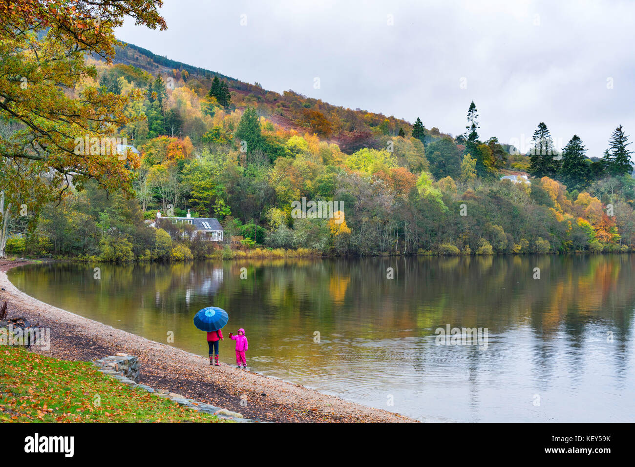 View of waterfront at village of Kenmore during autumn on Loch Tay in Perthshire , Scotland, United Kingdom. Stock Photo