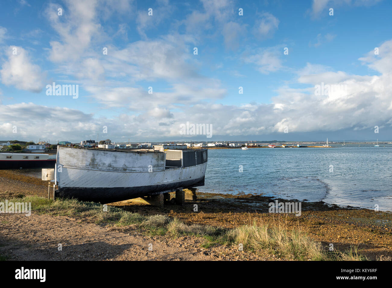Houseboat on the shore of Kench Cove, Hayling Island, Langstone Harbour