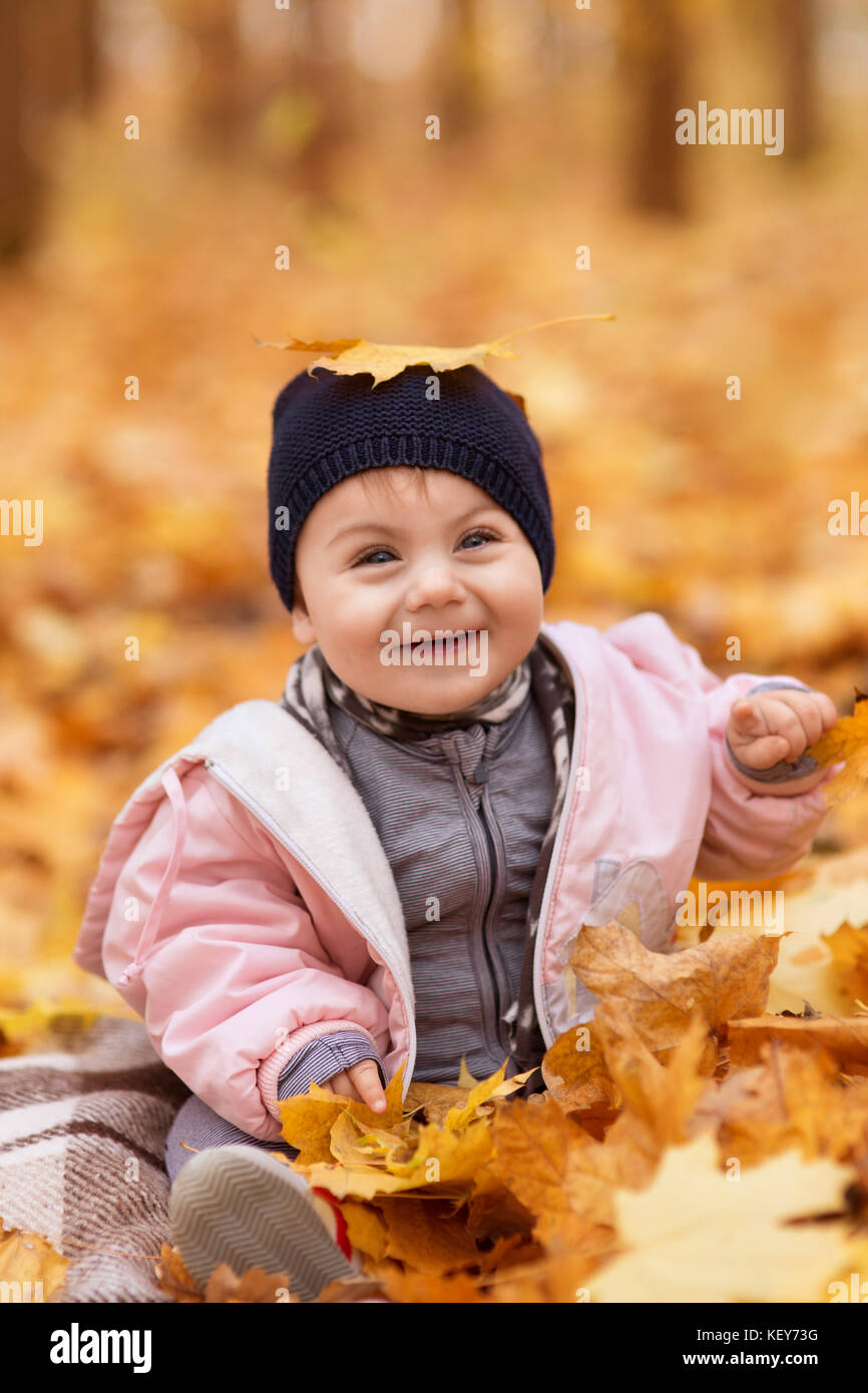 little girl in the autumn park Stock Photo - Alamy