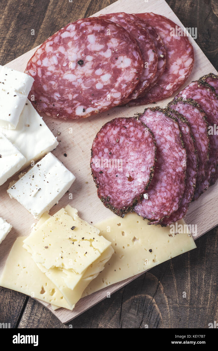 Cheese and cured meat charcuterie selection salami, from above Stock