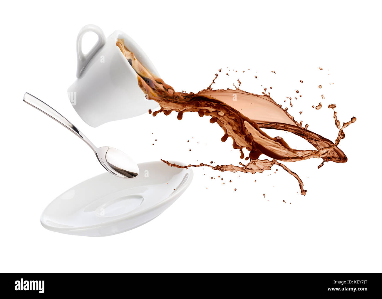 cup of coffee spils with saucer, spoon and coffee falls on white background Stock Photo Alamy