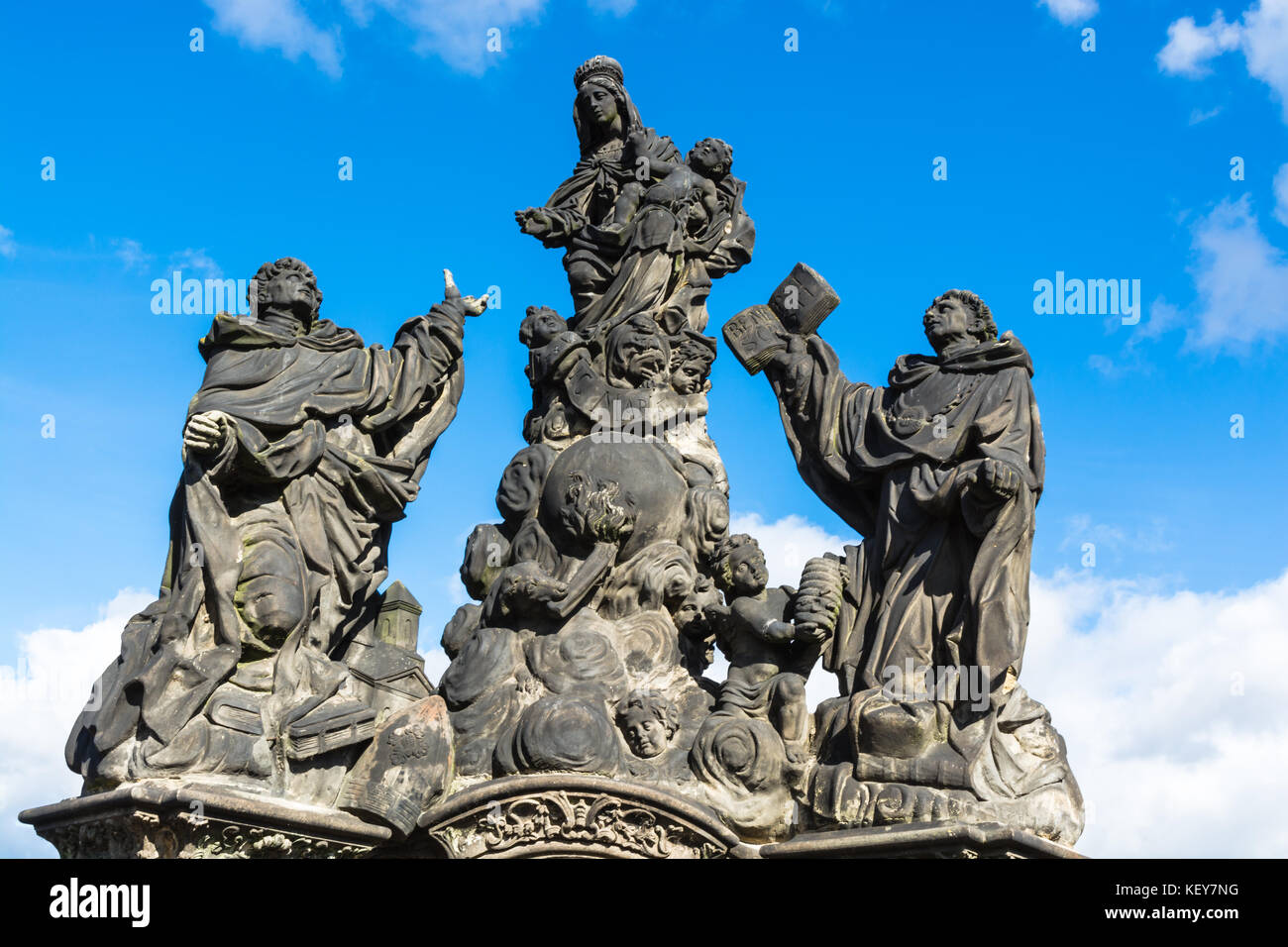 Prague, Czech Republic: Statues of Madonna, Saint Dominic and Thomas Aquinas, outdoor sculptures by Matej Vaclav Jackel on the north side of Charles B Stock Photo