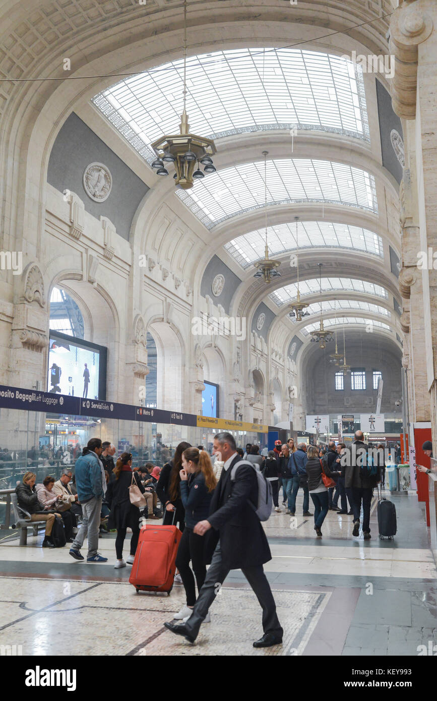 Passengers at Milan's Central station servicing major Italian cities and internationally Stock Photo