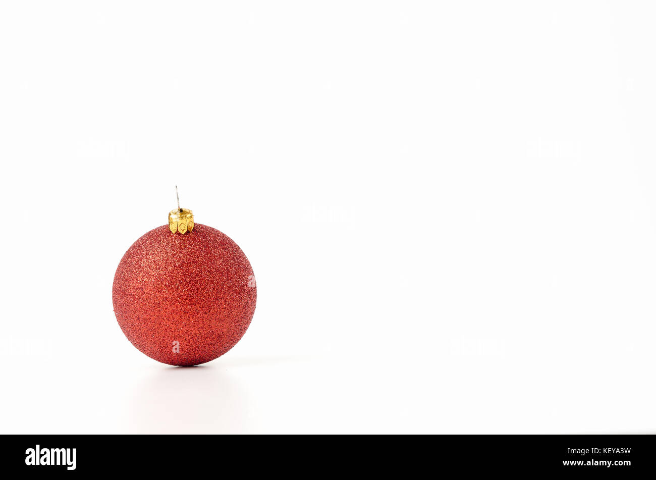 Red Christmas ball isolated on white background Stock Photo - Alamy