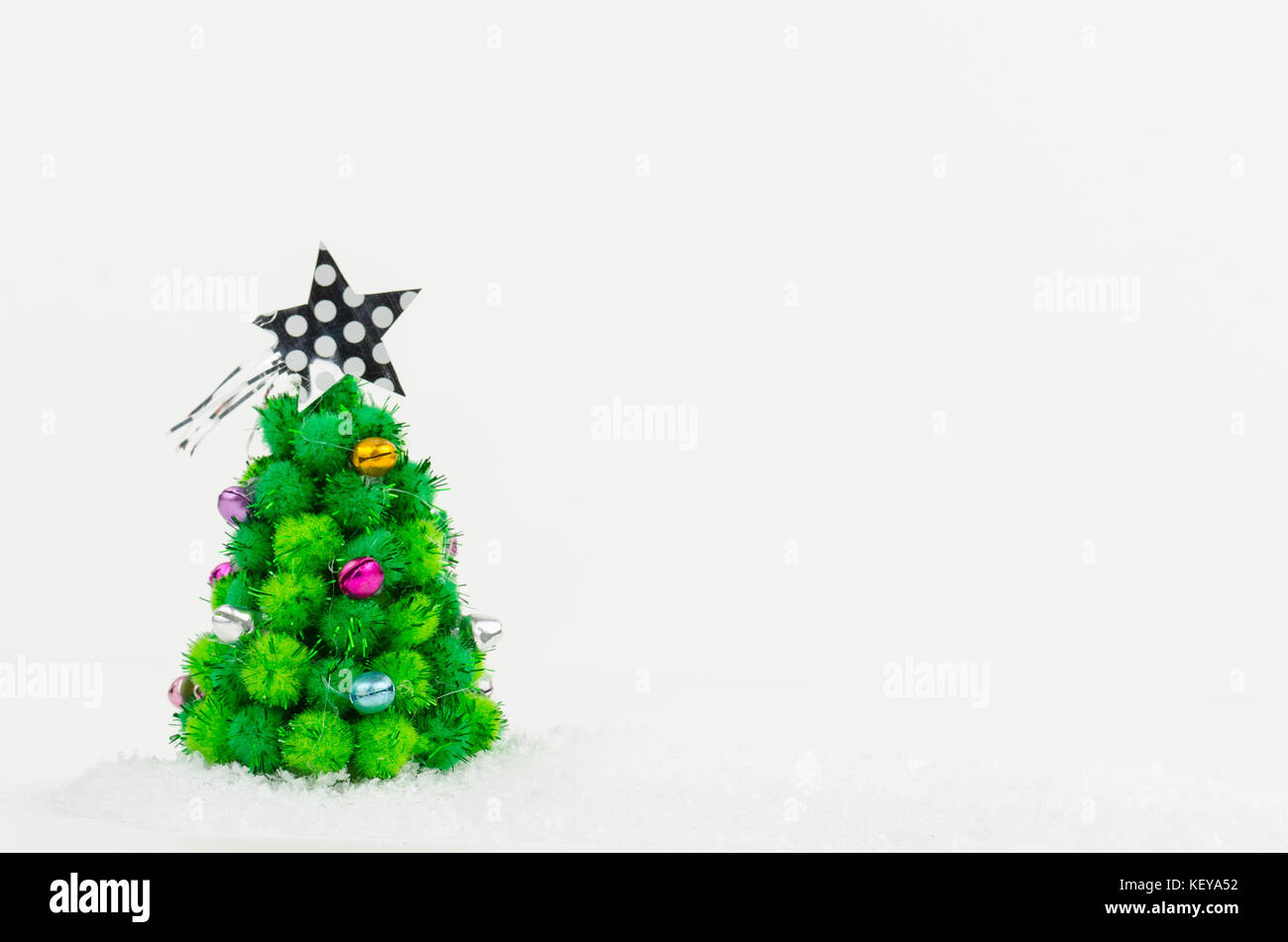 little Christmas tree isolated on white background Stock Photo - Alamy