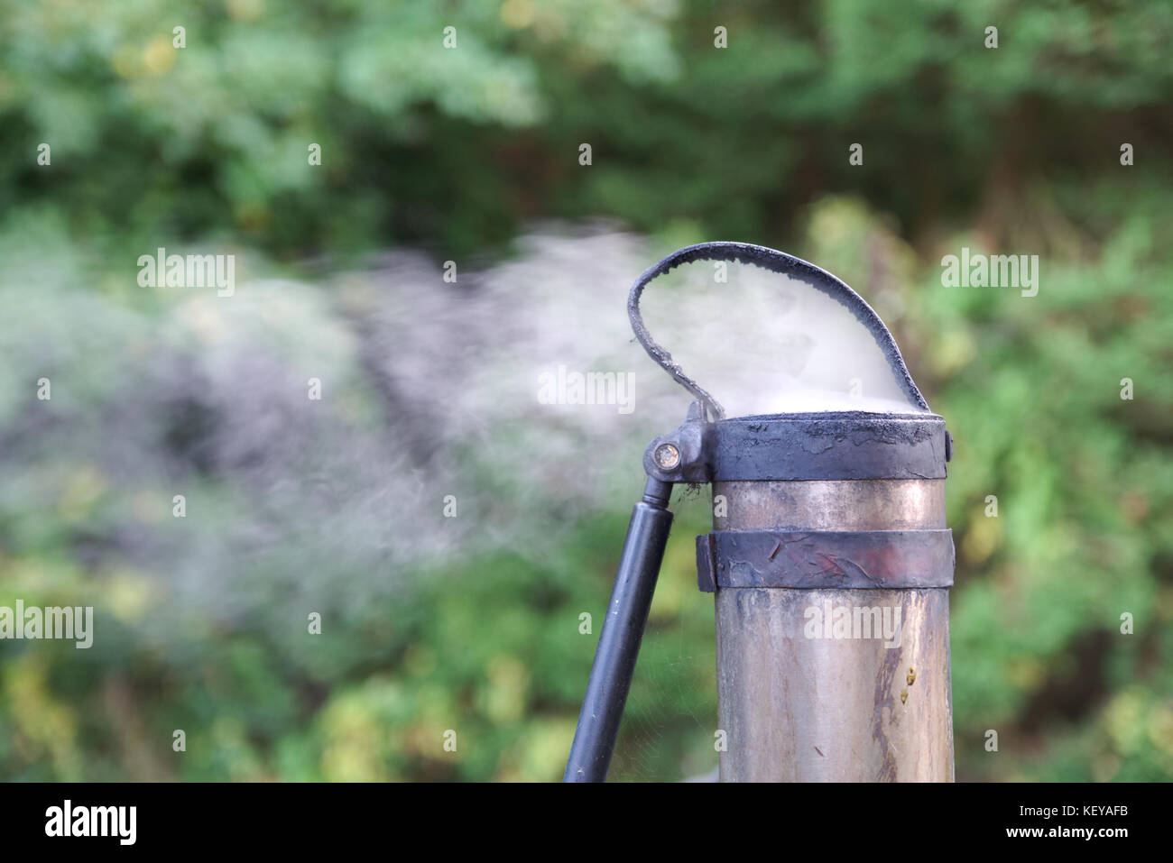 Steam coming out of an old canal boat chimney. Chimney on the right hand side of the image Stock Photo