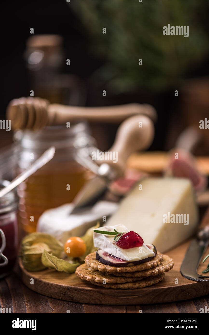 Cheese crackers with camembert,cranberry,fig and herb. Festive and