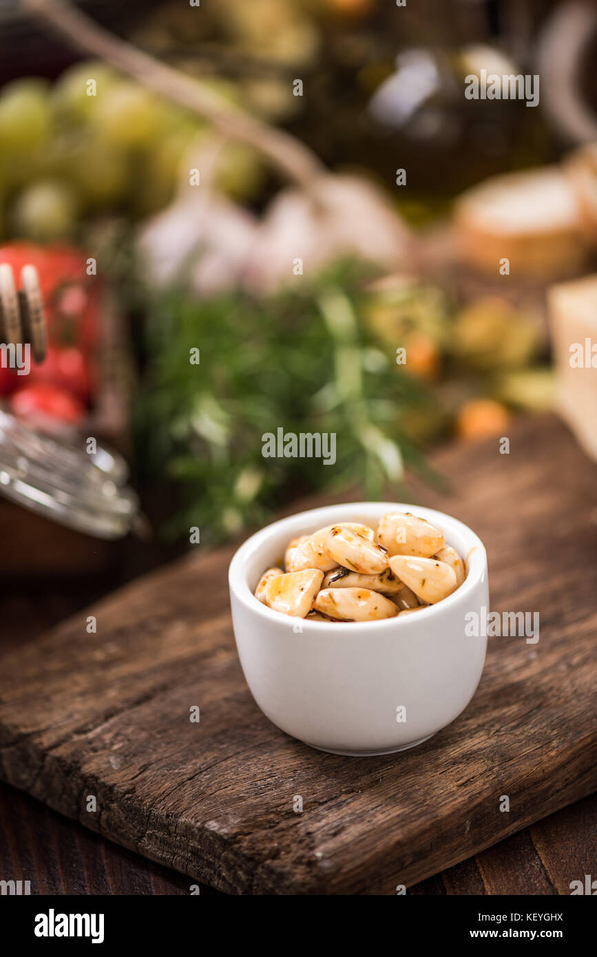 Spicy garlic cloves in bowl,spanish tapa bar food Stock Photo Alamy