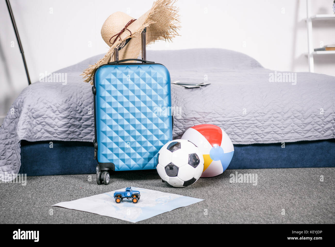 suitcase with straw hat Stock Photo