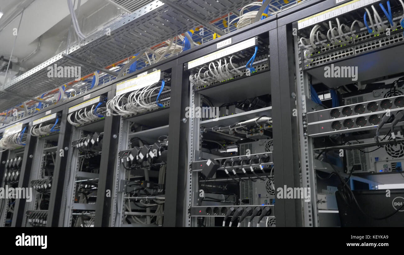 Device for mining crypto currency. Row of bitcoin miners set up on the
