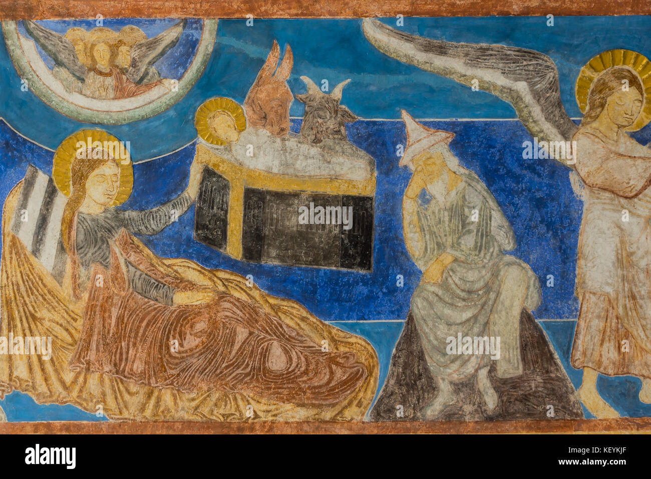 The birth in the stable, Christmas fresco in a medieval church. Bjaresjo, Sweden, September 4, 2014 Stock Photo