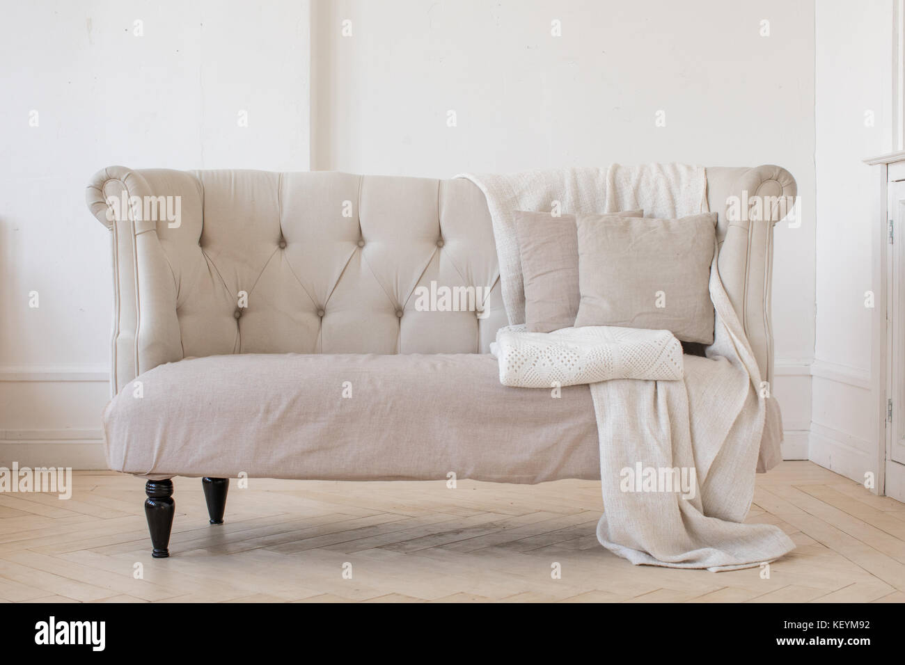 Small sofa in room on a white background Stock Photo