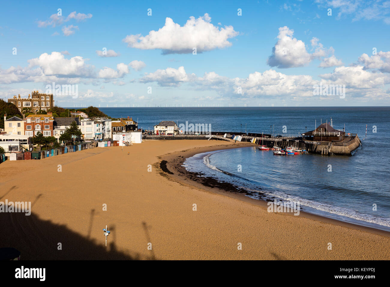 Broadstairs beach and Harbour and the town in the background and Bleak