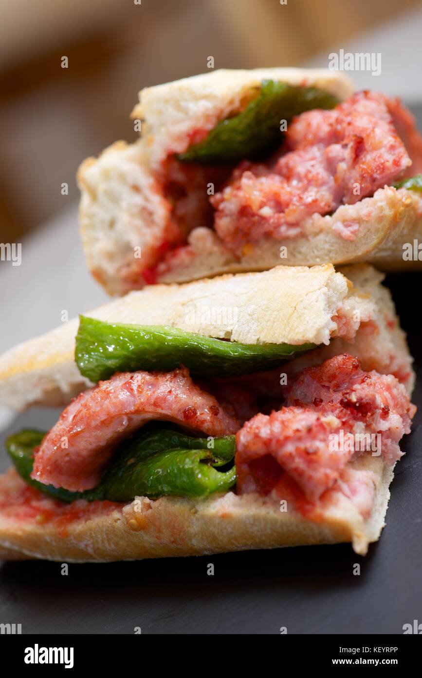 Sausage butty with green pepper and tomato Stock Photo Alamy