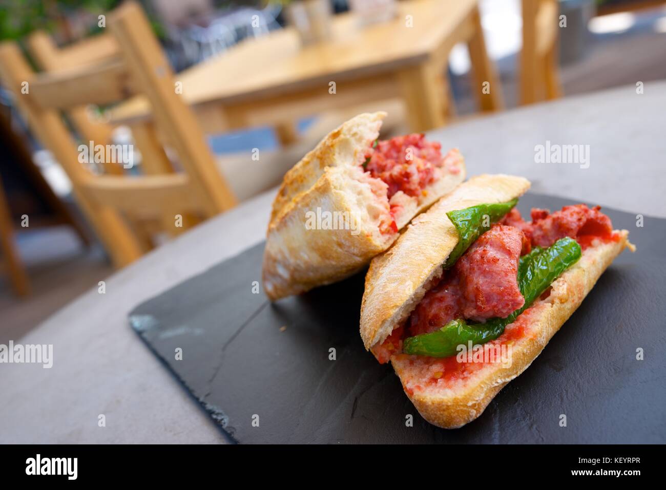Sausage butty with green pepper and tomato Stock Photo Alamy